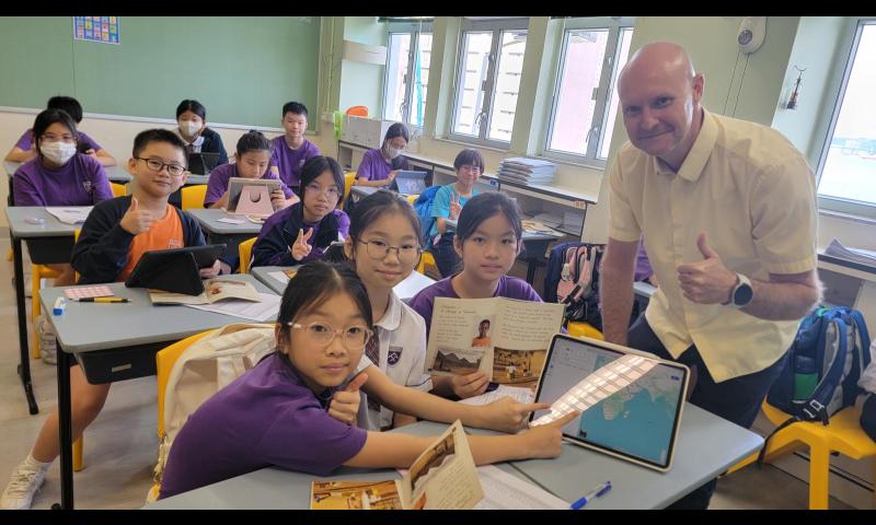 Mr O’Neil instructs students to utilize IT to understand local and world issues in KEYS2 programme.