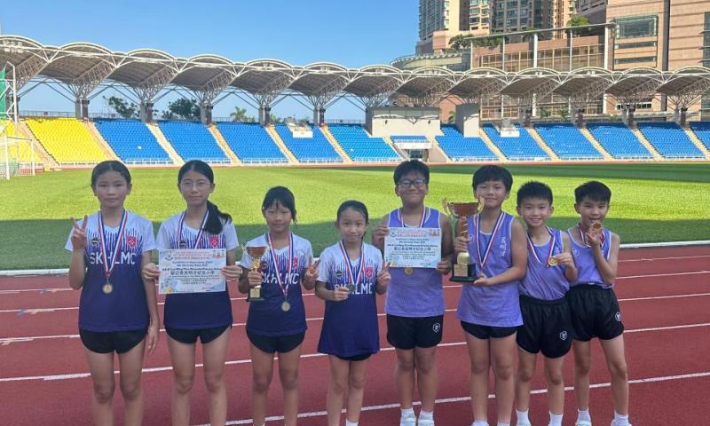 本校田徑隊男子組及女子組得獎同學合照